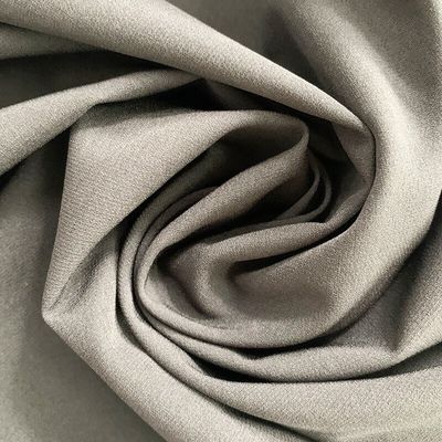 92% de polyester 8% de tissu spandex Matériau Jacquard Pearl Dot Pantalon de plage élastique à quatre côtés Tissu